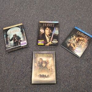 Lot of 4 The Hobbit Trilogy and LOTR Fellowship movies pre-owned